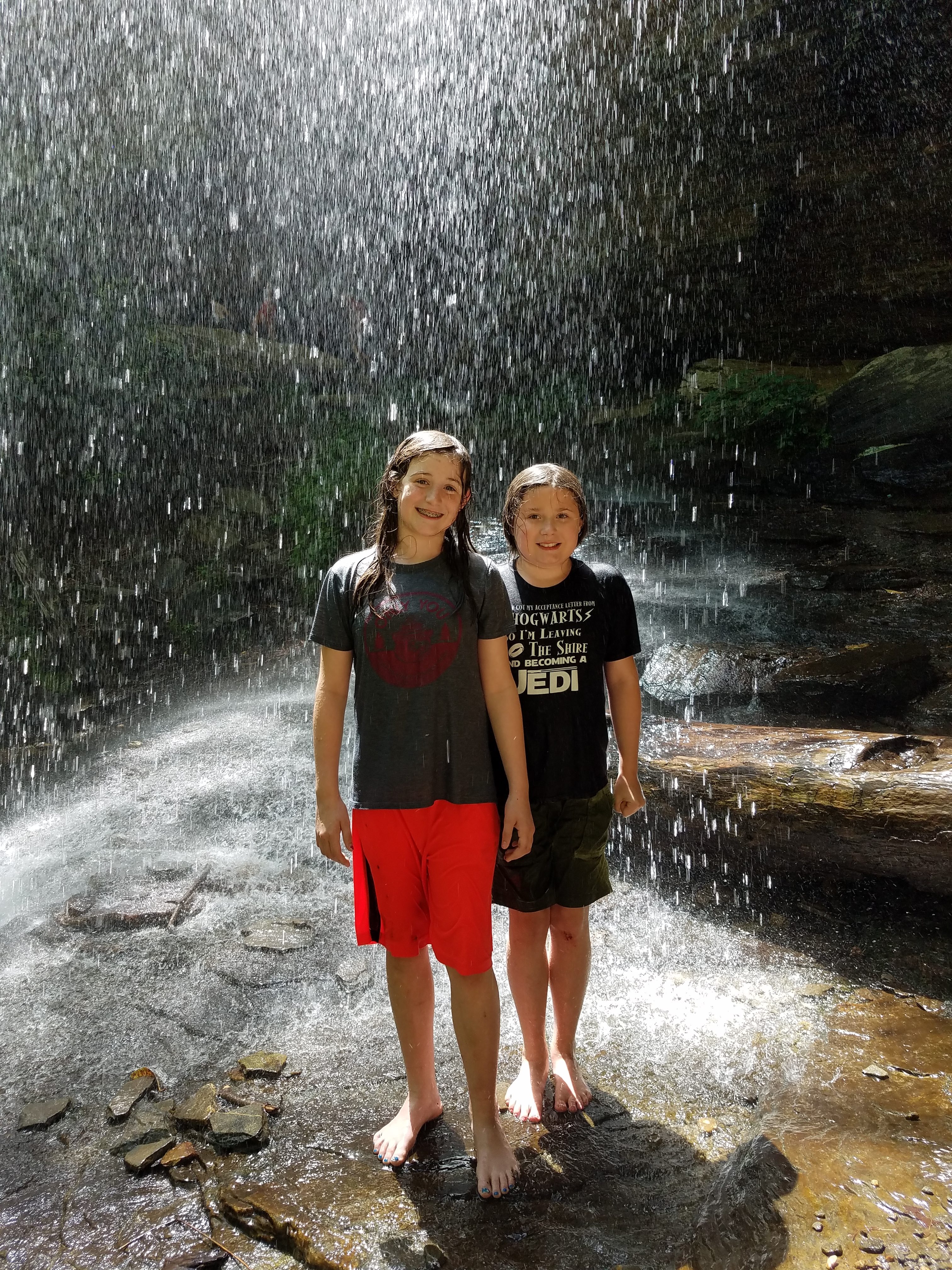 Kids Underneath Moore Falls Asheville North Carolina